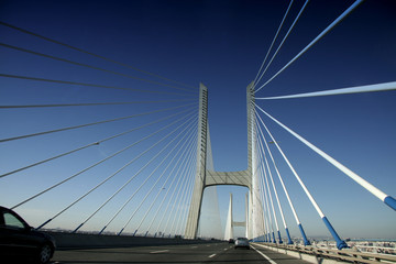 Fototapeta na wymiar Driving along car the Vasco da Gama Bridge