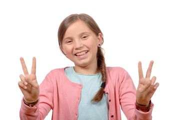 young girl showing her hands by doing victory gesture