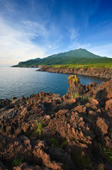 Fototapeta na wymiar Lava field on the coast of the island of Iturup. Yankito plateau.