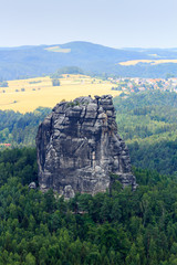 Panorama with mountain rock Falkenstein seen from Schrammstein viewing point in Saxon Switzerland