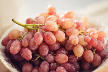 Grapes in a plate on the table