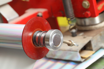 Close-up of one of printing machines