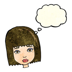cartoon female face with thought bubble