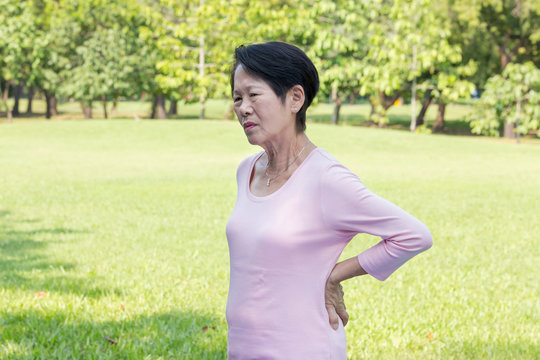 Asian senior woman back pain