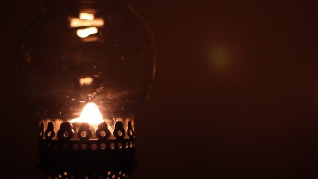 Burning kerosene lamp