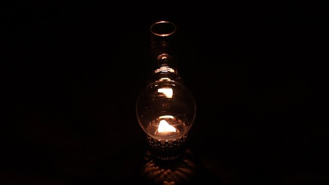 Burning kerosene lamp