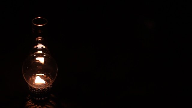 Burning kerosene lamp