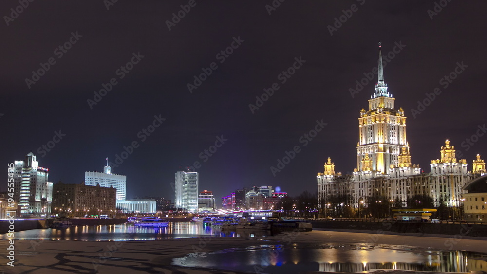 Wall mural hotel ukraine winter night timelapse. seen as reflected in the moscow river