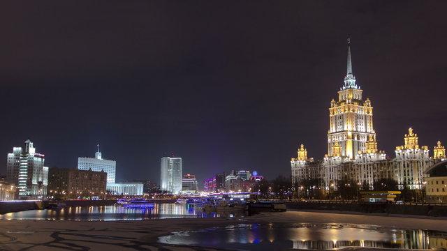 Hotel Ukraine winter night timelapse. Seen as reflected in the Moscow River