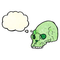 cartoon spooky skull with thought bubble