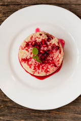 Rice pudding with pomegranate sauce