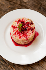 Rice pudding with pomegranate sauce