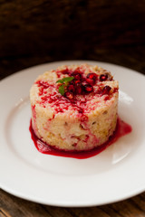 Rice pudding with pomegranate sauce