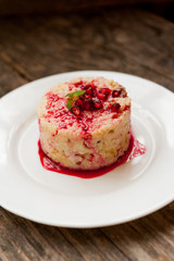 Rice pudding with pomegranate sauce