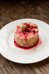 Rice pudding with pomegranate sauce