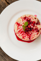 Rice pudding with pomegranate sauce