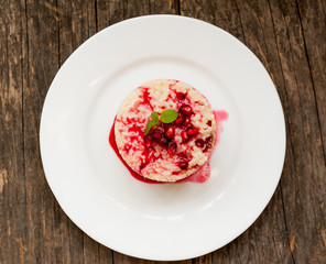 Rice pudding with pomegranate sauce