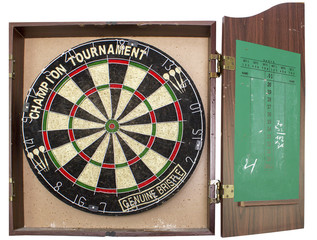 A professional dart board enclosed in a cabinet with slate chalk