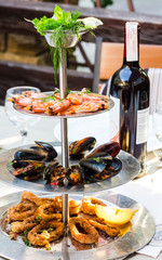 tray of assorted seafood, prawns, mussels, calamari
