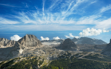 aerial view of the italian dolomites under a blue sky
