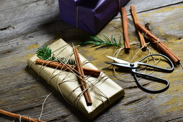 Stylish & Vintage christmas gifts box presents on the old wooden table
