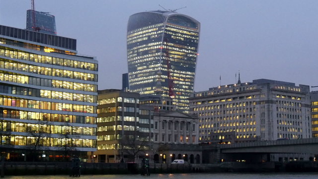 The beautiful city of London at early evening where lights are all open in every buildings