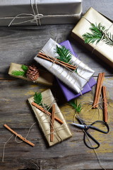 Stylish & Vintage christmas gifts box presents on the old wooden table