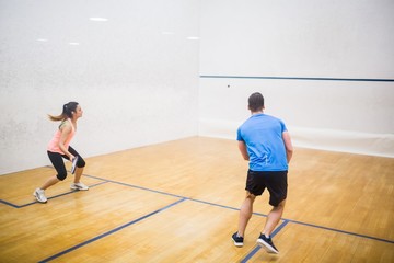 Couple enjoying a game of squash