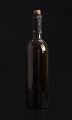 wine bottle. Isolated on black background