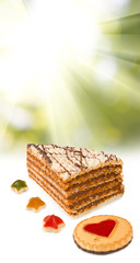 Image of cakes on rays  background