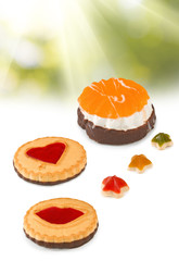 Image of various cakes on rays  background