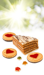 various cakes on rays  background