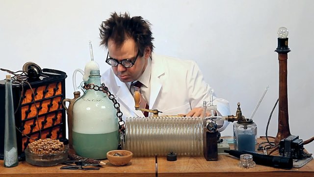 the scientist produces elixir in laboratory