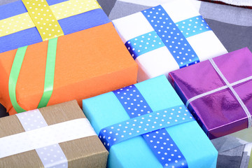 Fototapeta na wymiar bright gifts with ribbons, holiday invitation card