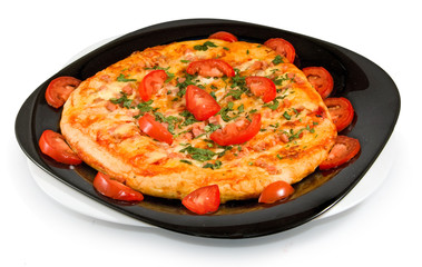 Isolated image of a tasty pizza on a plate closeup