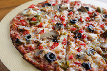 Closeup of a vegetarian flat bread thin crust pizza