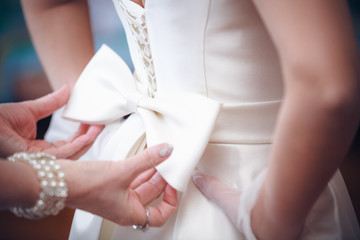 Fototapeta na wymiar Detail of bridal dress from back