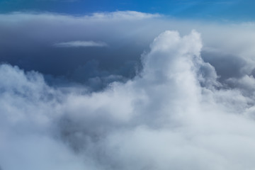 Fototapeta na wymiar Sky with clouds from airplane