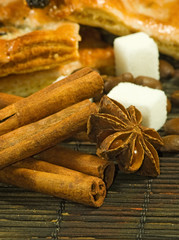 image of cookies, anise stars, sugar, coffee beans closeup
