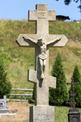 Old, abandoned stony Orthodox crosses