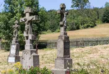 Old, abandoned stony Orthodox crosses