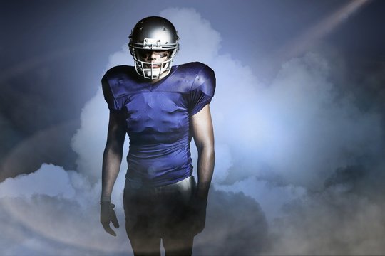 Composite image of american football player standing