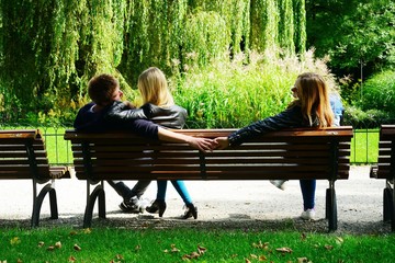 Love triangle in Vilnius town Bernardinu garden on autumn
