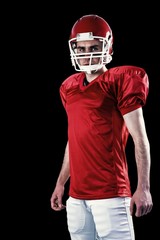 Composite image of a serious american football player