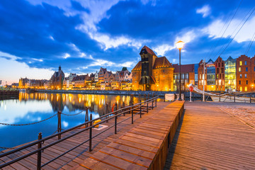 Old town of Gdansk with ancient crane at dusk, Poland