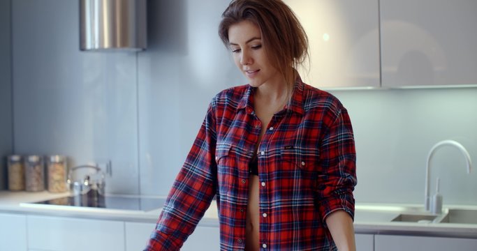 Cute Young Woman in Her Kitchen