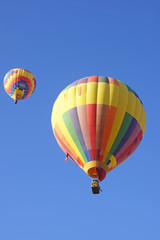 Balloons fill the air over wine vineyard during 2015 Temecula Balloon Festival in California