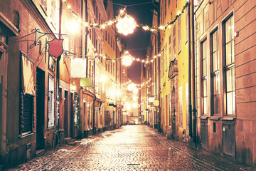 The night street in Gamla Stan, Stockholm. - obrazy, fototapety, plakaty
