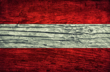 Vintage flag of Austria on wooden surface