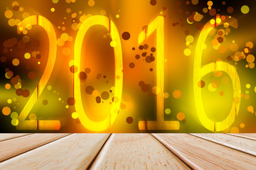 2016 year with sparkling bokeh wall and wooden plank floor